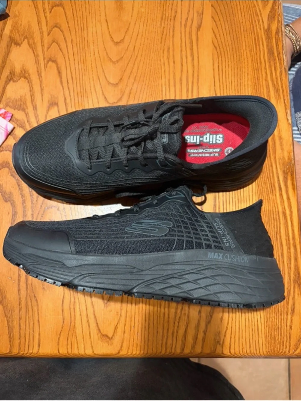 Skechers Men’s Black Athletic Sneakers with Red Insole Accent